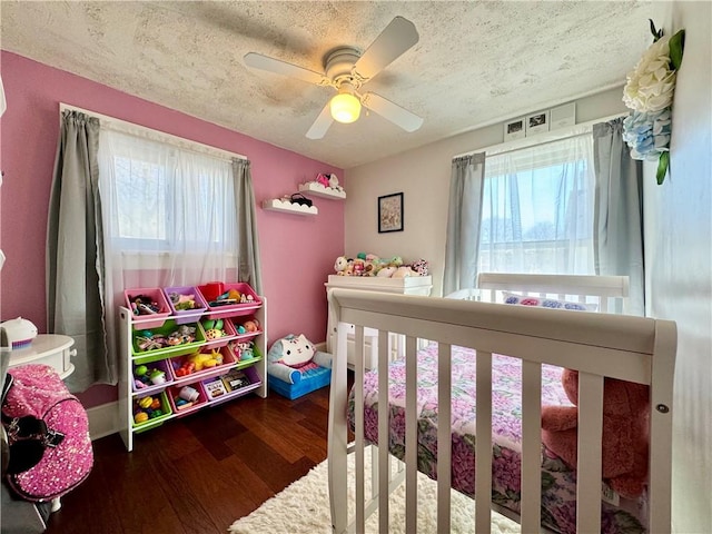 464 Pine St, Erwin, NY 14870 - bedroom featuring ceiling fan, wood finished floors, and a textured ceiling
