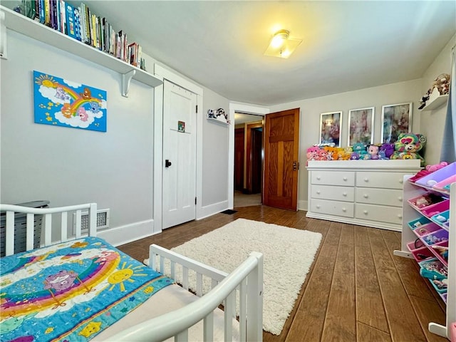 464 Pine St, Erwin, NY 14870 - bedroom with visible vents, baseboards, and wood-type flooring