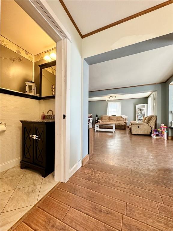 464 Pine St, Erwin, NY 14870 - hallway featuring crown molding and wood finished floors
