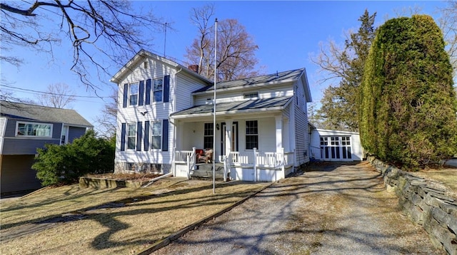 traditional-style house with a porch