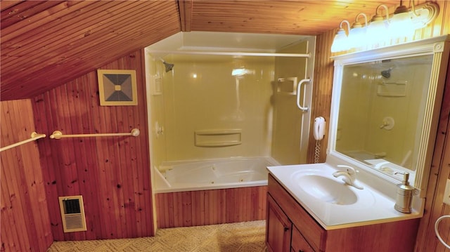 bathroom with visible vents, a combined bath / shower with jetted tub, wooden ceiling, vanity, and vaulted ceiling