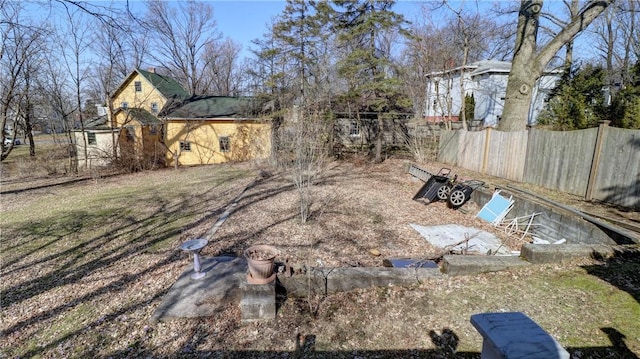 view of yard featuring fence