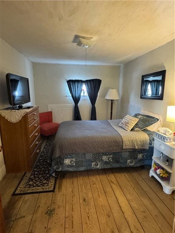 bedroom featuring hardwood / wood-style flooring