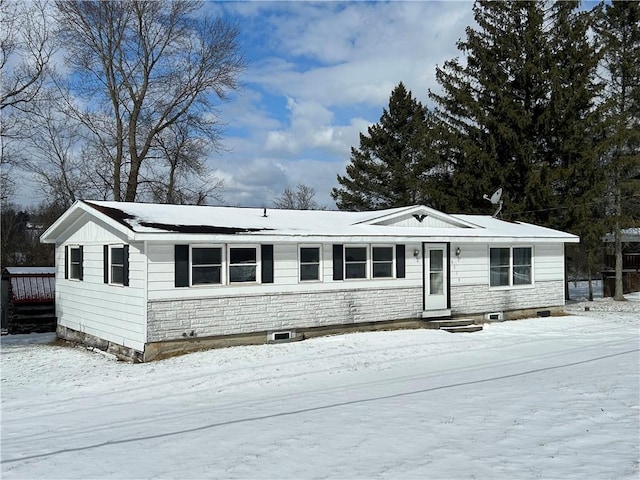 view of front of property featuring stone siding