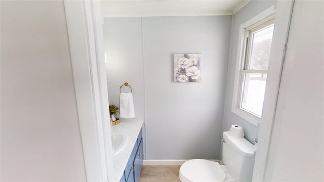 6339 County Road 32, North Norwich, NY 13815 - half bathroom with vanity, baseboards, and toilet