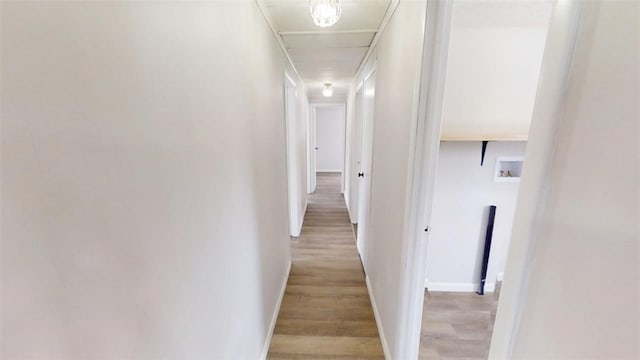 6339 County Road 32, North Norwich, NY 13815 - hallway with light wood-style floors and baseboards