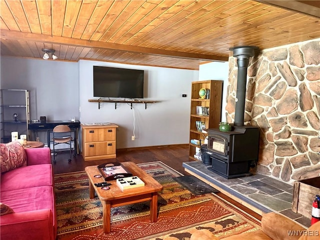 living room featuring wood ceiling, a wood stove, wood finished floors, and beamed ceiling