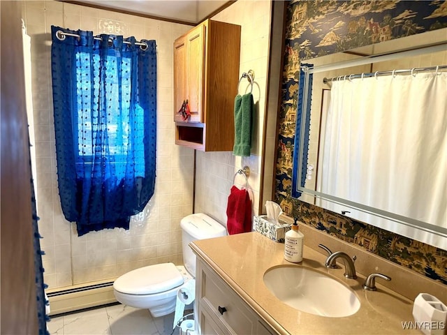 bathroom featuring curtained shower, toilet, vanity, baseboard heating, and tile walls