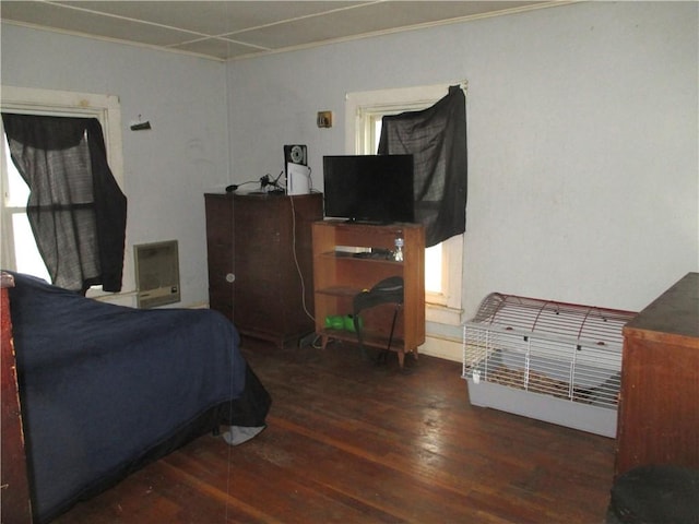 bedroom featuring wood finished floors