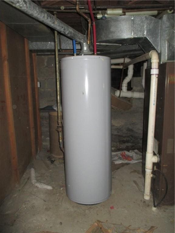 utility room with water heater