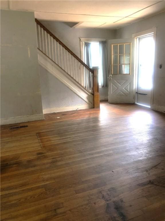 15 8th St, Oneonta-City, NY 13820 - entryway with wood finished floors, stairs, and baseboards