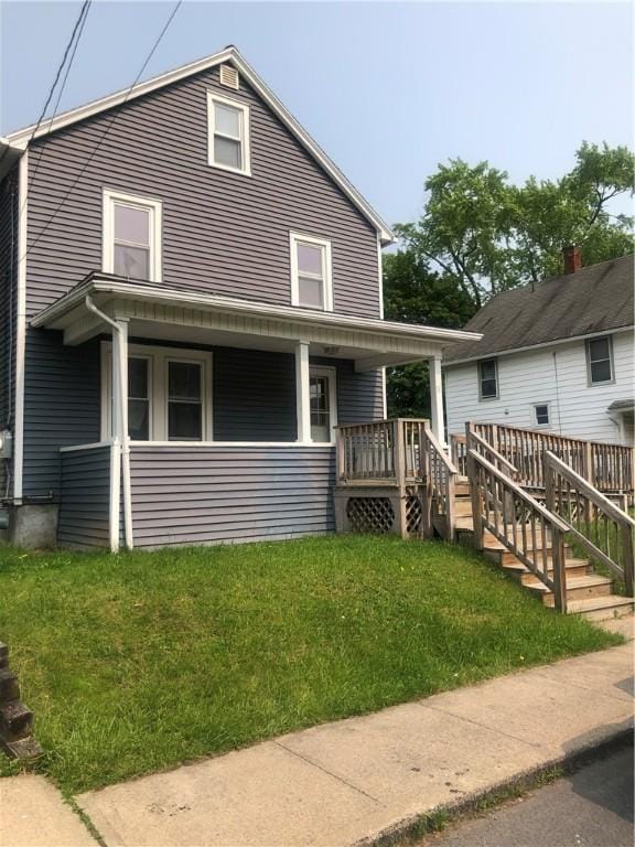15 8th St, Oneonta-City, NY 13820 - view of front of home with a front lawn and a porch