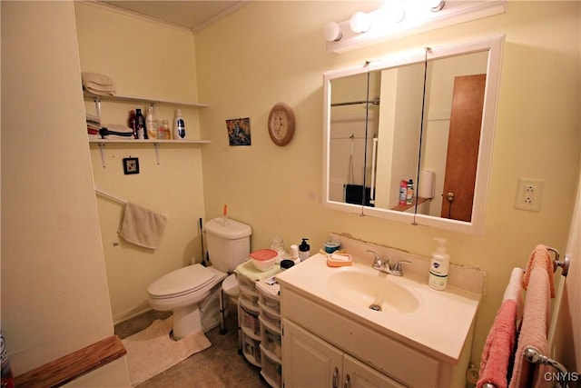 bathroom with vanity, baseboards, ornamental molding, tile patterned floors, and toilet