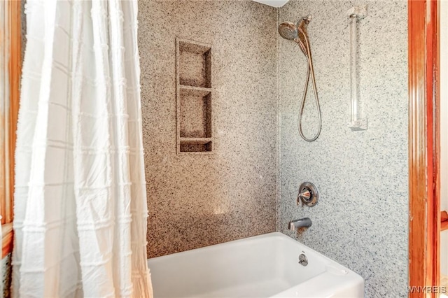 bathroom featuring shower / bath combination with curtain