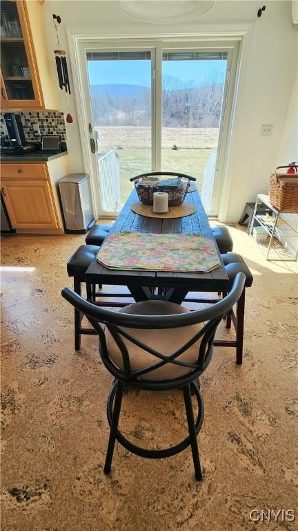 dining room with plenty of natural light