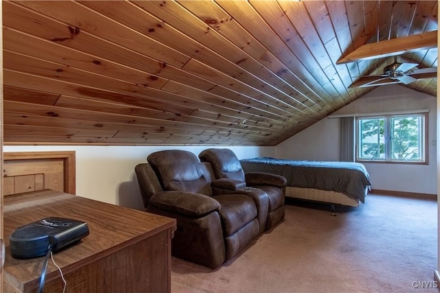 cinema room with a ceiling fan, carpet, baseboards, lofted ceiling, and wooden ceiling