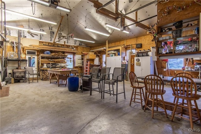 interior space with a workshop area and a garage door opener