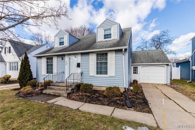 new england style home with concrete driveway, a garage, and roof with shingles