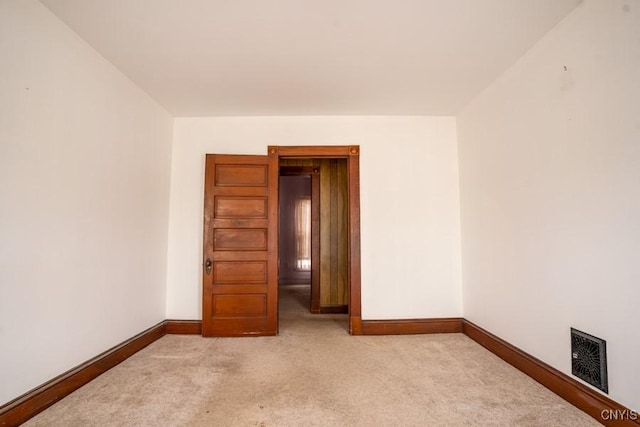 310 E German St, Herkimer, NY 13350 - spare room featuring light carpet, baseboards, and visible vents
