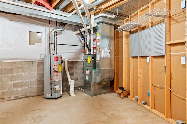 utility room featuring heating unit and water heater