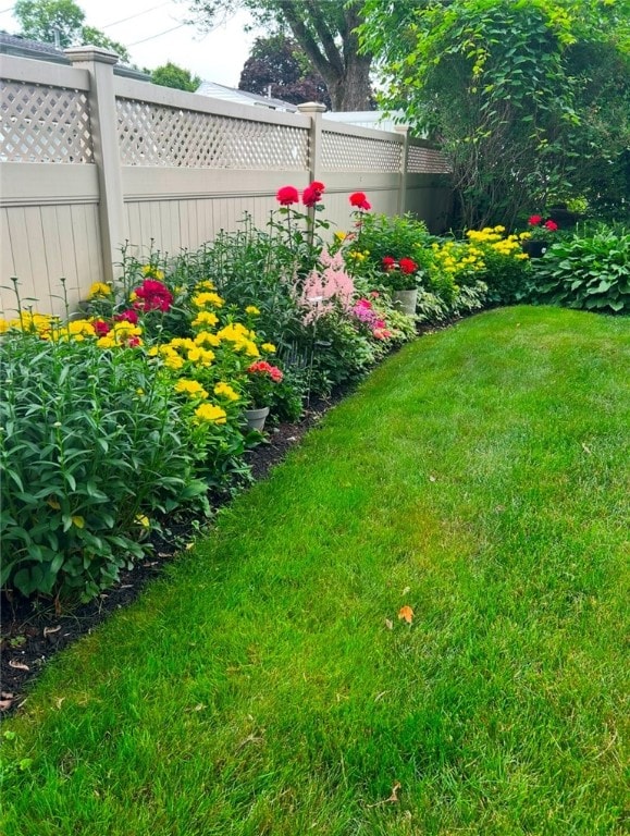 view of yard featuring fence