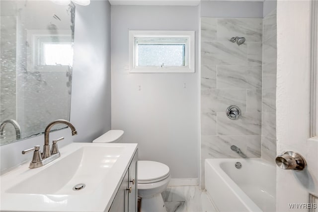 full bath with a wealth of natural light, marble finish floor, toilet, and vanity