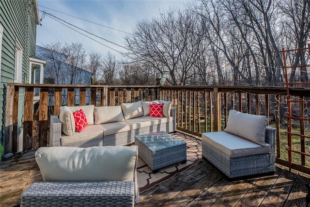 wooden deck featuring an outdoor living space