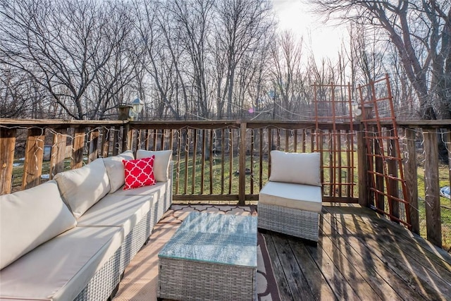 wooden terrace featuring an outdoor living space