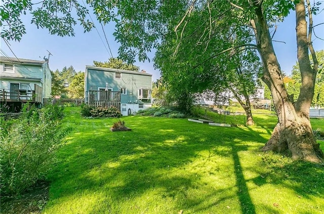 view of yard featuring a deck