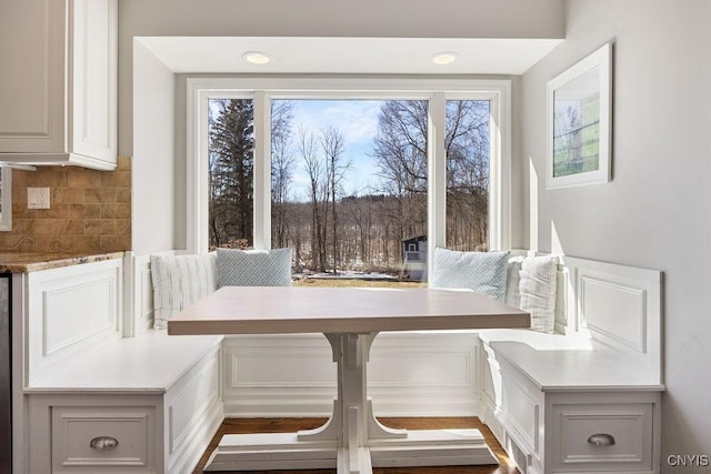 unfurnished dining area featuring breakfast area