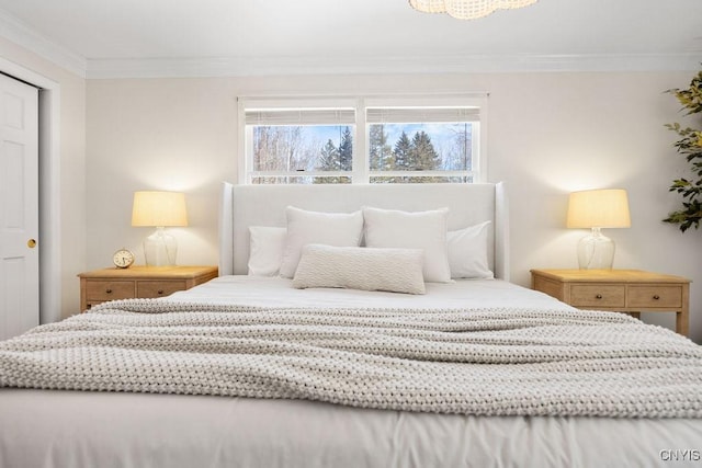 bedroom featuring crown molding