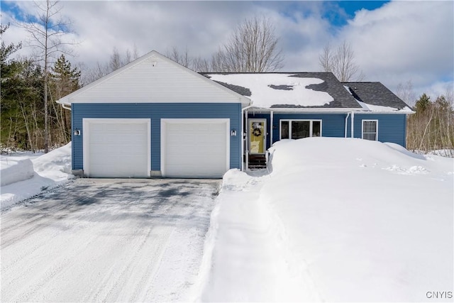 single story home featuring a garage