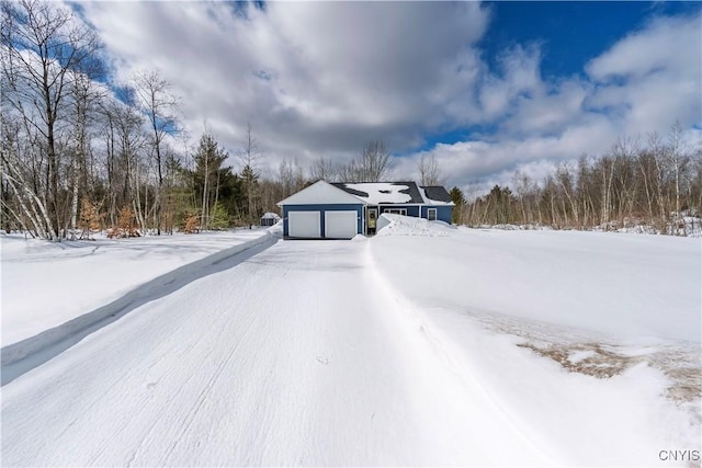 view of road with driveway