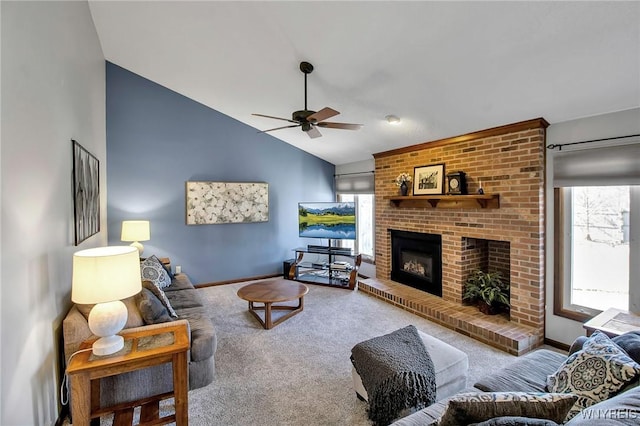 living room featuring carpet flooring, ceiling fan, a brick fireplace, and lofted ceiling