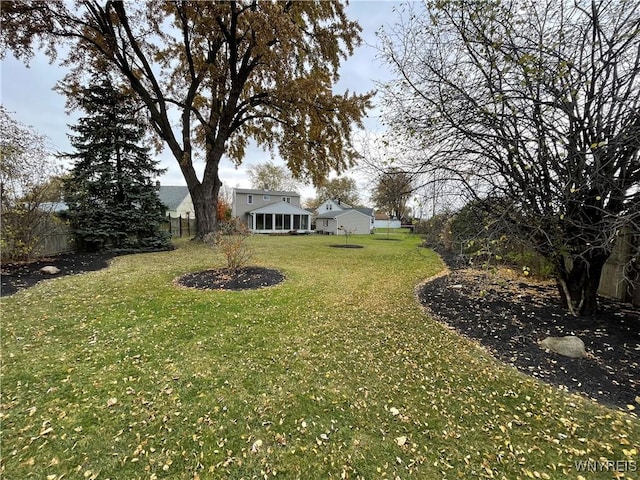 view of yard with fence