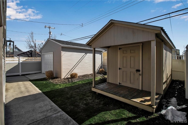 view of outdoor structure with an outdoor structure and fence