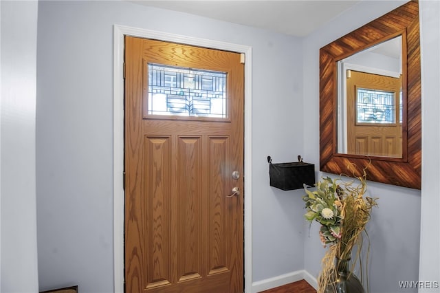 entrance foyer featuring baseboards