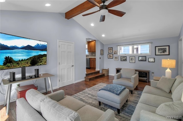 living room with dark wood-type flooring, a ceiling fan, recessed lighting, baseboards, and vaulted ceiling with beams