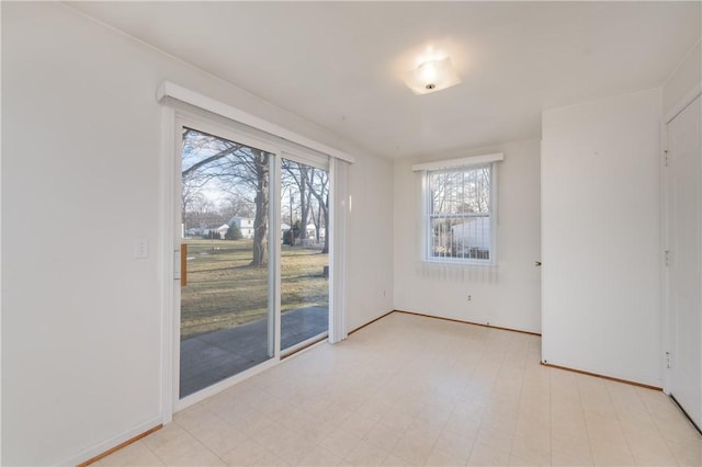 unfurnished room with light floors