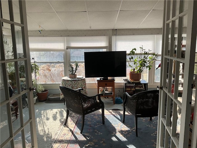 sunroom with french doors and a paneled ceiling