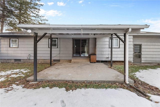 rear view of house featuring a patio