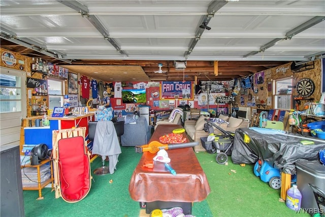 garage featuring a workshop area and a garage door opener