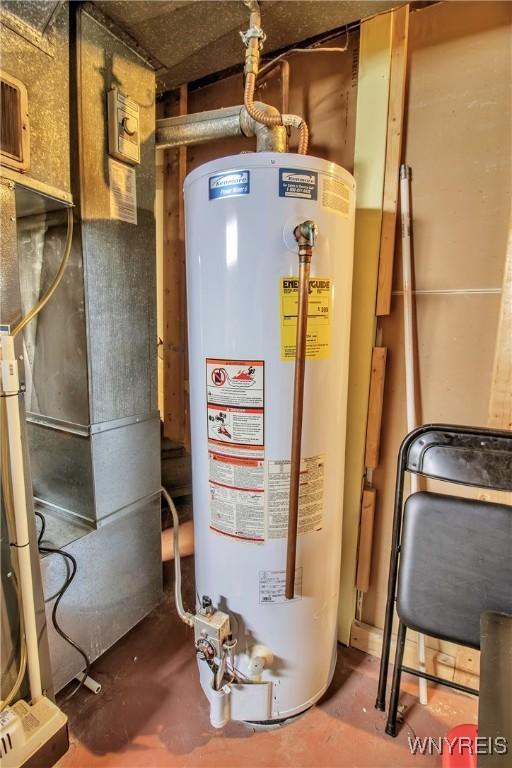 utility room with gas water heater