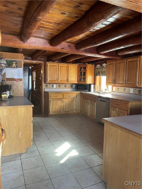 kitchen featuring light tile patterned floors, beam ceiling, stainless steel appliances, glass insert cabinets, and wooden ceiling