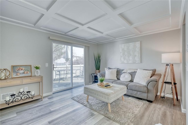 living room featuring beamed ceiling, baseboards, coffered ceiling, and wood finished floors