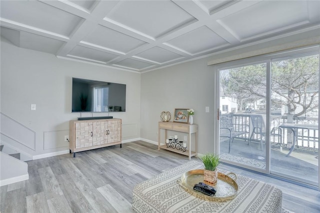 living room featuring beamed ceiling, baseboards, coffered ceiling, and wood finished floors