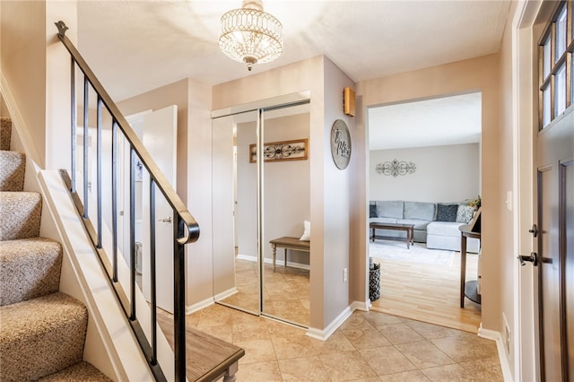 interior space with baseboards and tile patterned flooring