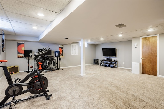 exercise area with recessed lighting, baseboards, carpet floors, and a paneled ceiling