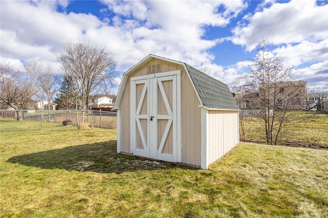 view of shed with fence