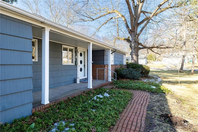 entrance to property with covered porch